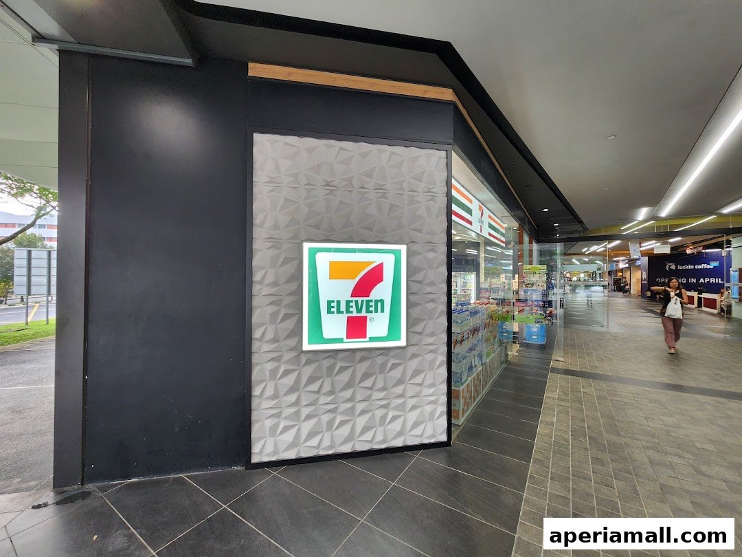 The exterior of a 7-Eleven convenience store with its iconic logo prominently displayed.