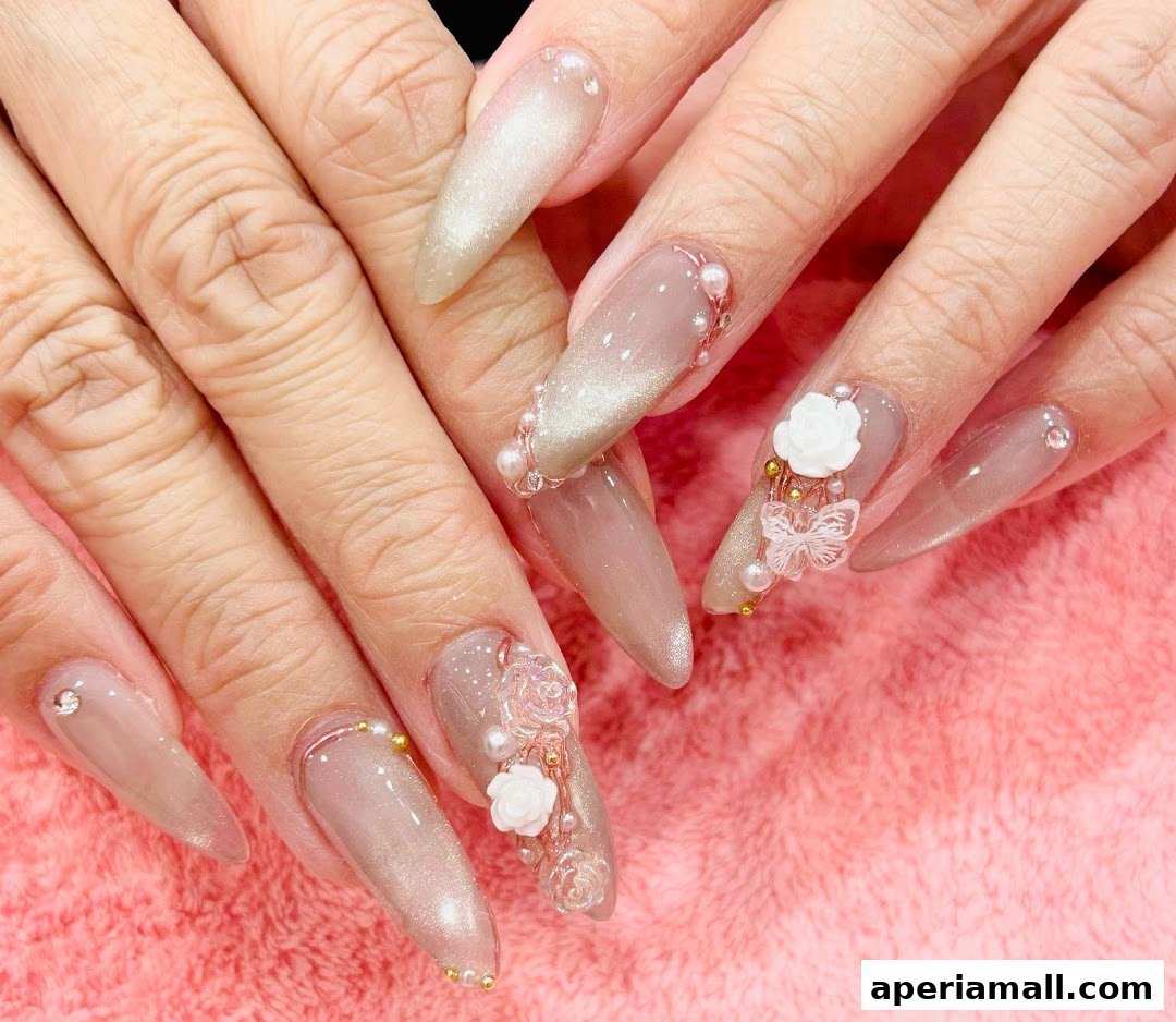 Close-up of hands with elaborate, decorated long nails featuring pearls, flowers, and butterflies.
