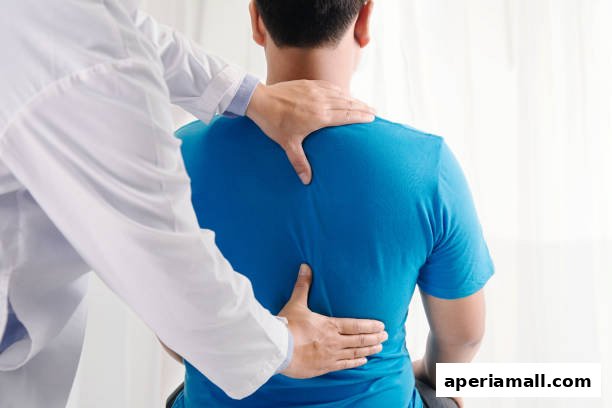 A chiropractor adjusts a patient's back, focusing on spinal alignment and pain relief.