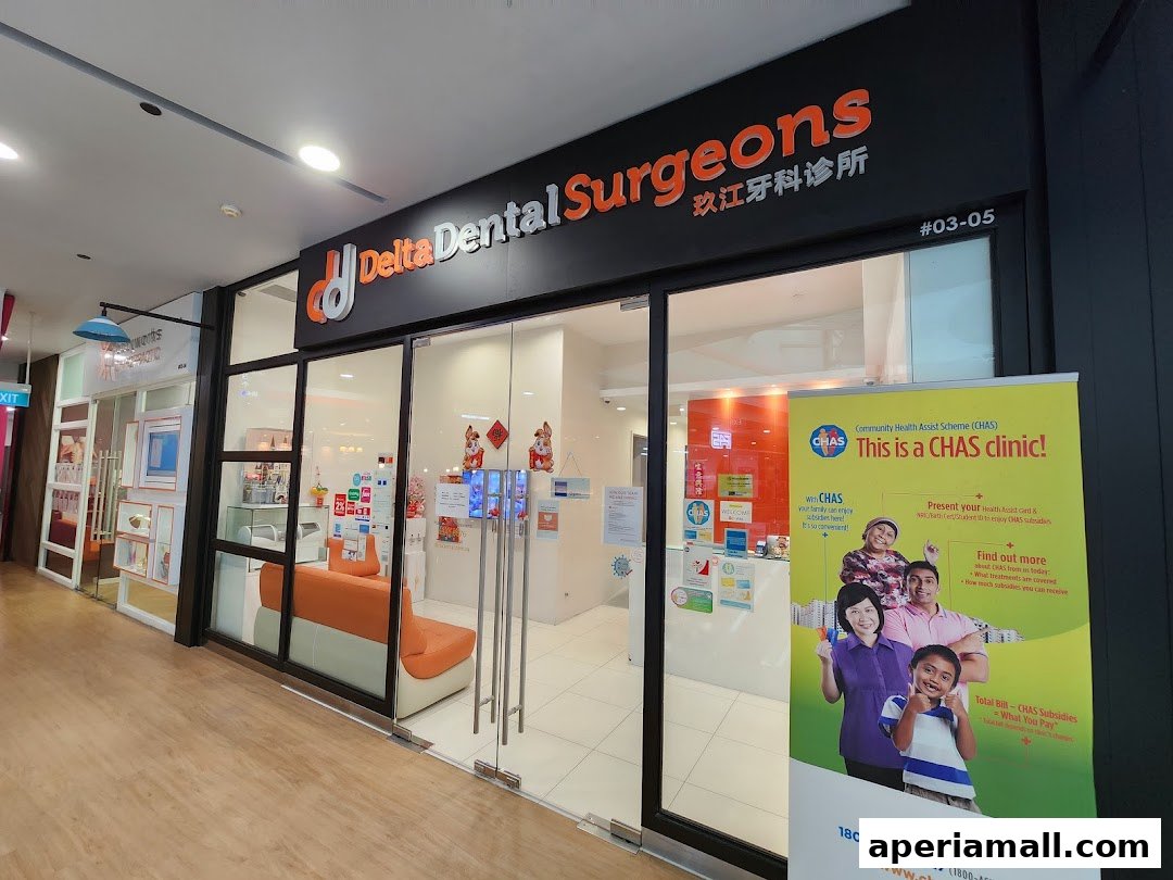 The exterior of a Delta Dental Surgeons clinic with a prominent sign and a promotional banner.