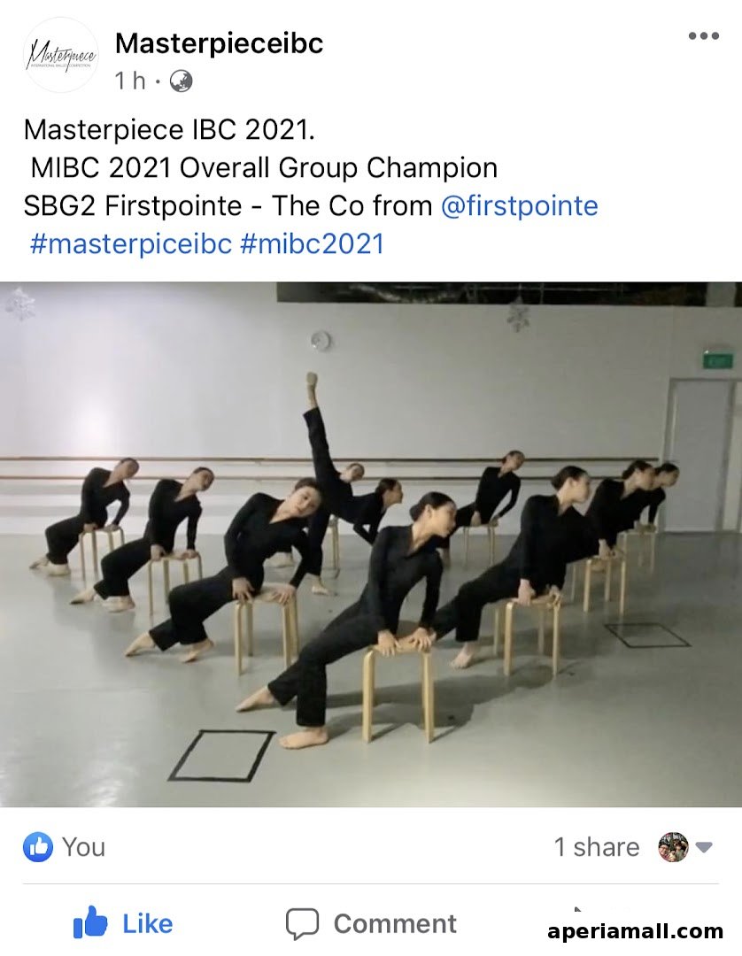Dancers in black outfits performing a synchronized routine on chairs.