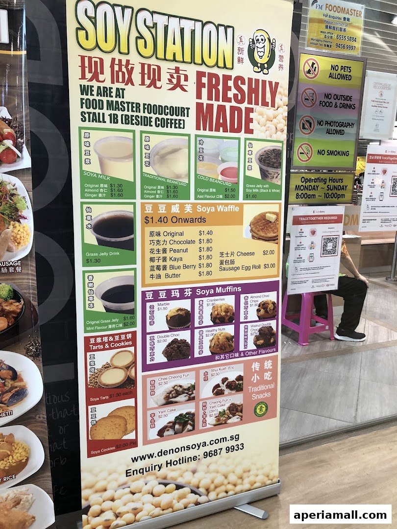 A colorful banner advertising Soy Station's freshly made soy products and traditional snacks.