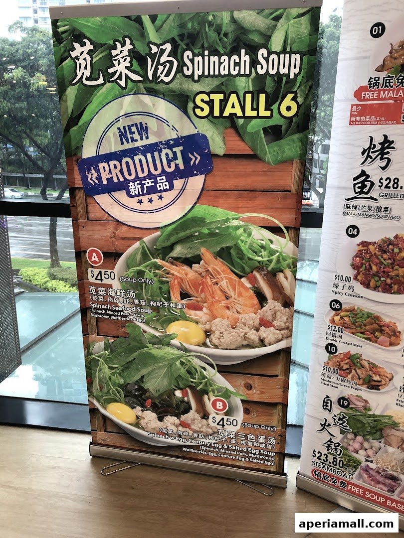 A display banner showcasing two types of spinach soup with ingredients and prices.