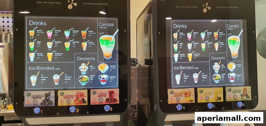Digital menu screens displaying a variety of drinks and desserts with prices.