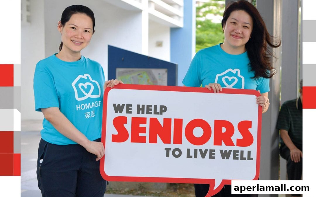 Two women in blue t-shirts hold a sign saying 'We help seniors to live well'.