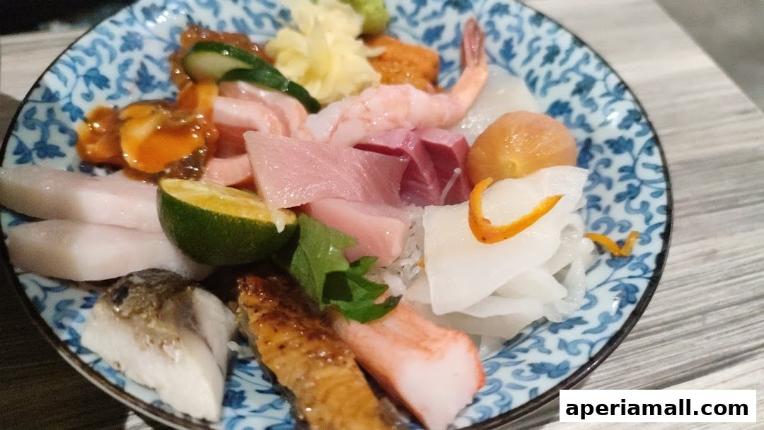 A close-up of a colorful and fresh sashimi platter with various seafood and garnishes.