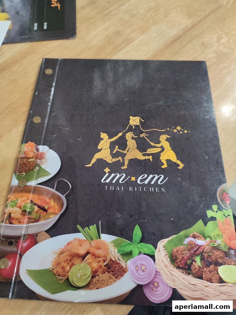 A menu from Im-Em Thai Kitchen featuring images of Pad Thai and other Thai dishes.