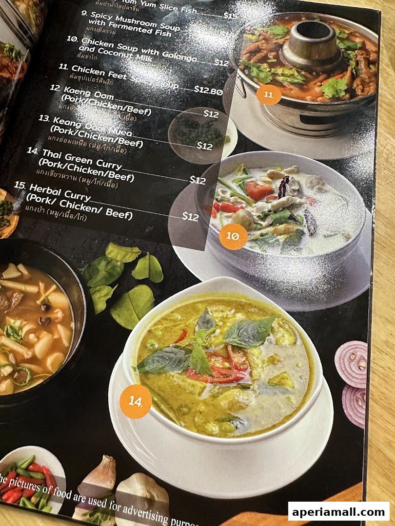 A menu from Im-Em Thai Kitchen showcasing various Thai dishes with prices and images.