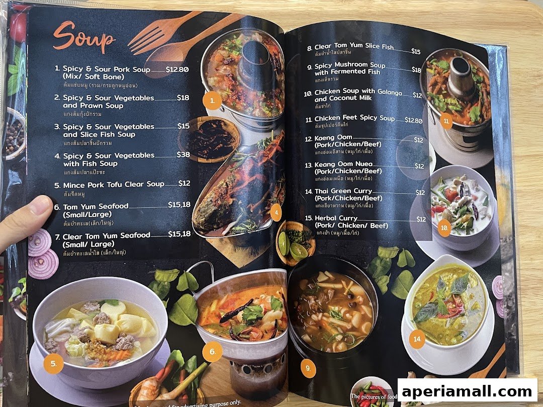 A menu from Im-Em Thai Kitchen featuring a variety of soups and curries with prices.