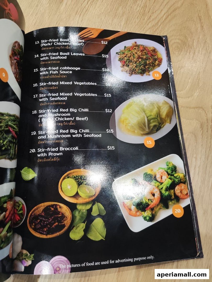 A menu from Im-Em Thai Kitchen featuring various stir-fried dishes with prices.