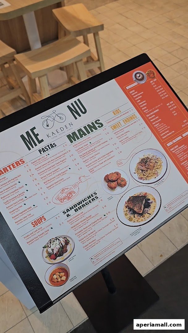 A menu from Kaeden restaurant featuring pastas, mains, sandwiches, burgers, soups, and desserts.