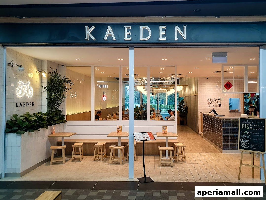 The exterior of the Kaeden shop, featuring a clean, modern design with outdoor seating.
