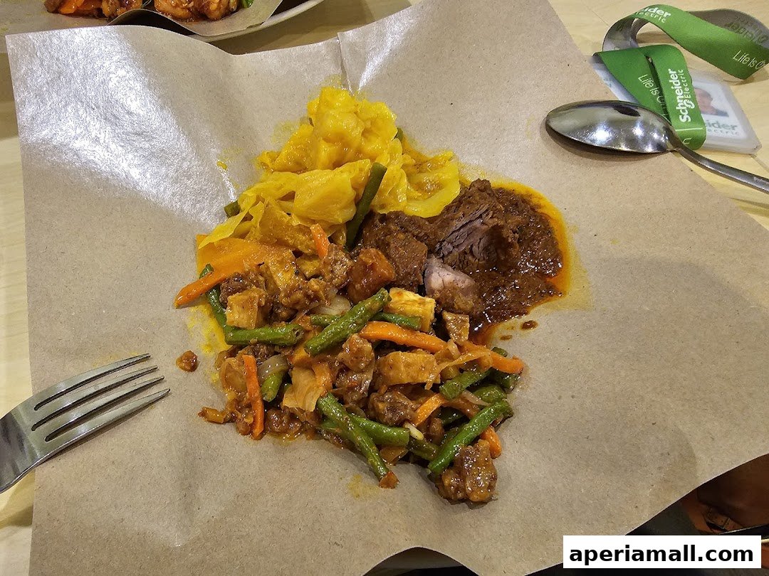 A plate of mixed Indonesian cuisine served on brown paper with a fork and spoon.