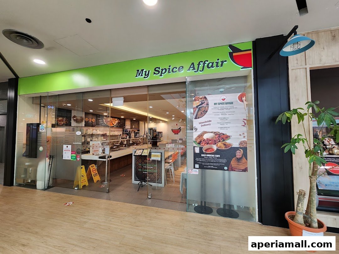 The exterior of a restaurant called My Spice Affair, with a menu displayed on the glass door.