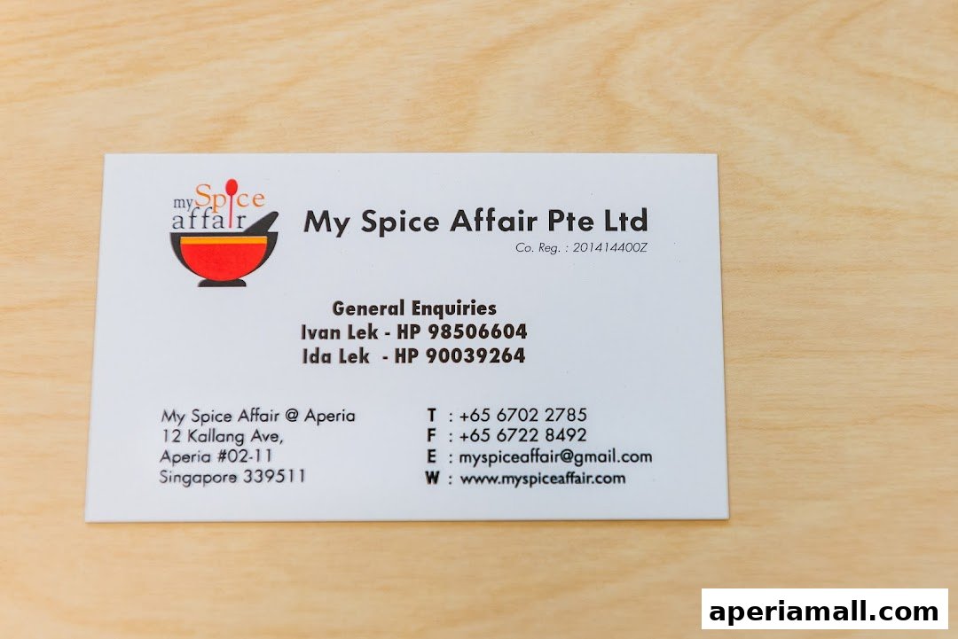 A business card for My Spice Affair Pte Ltd, featuring contact information and company details.