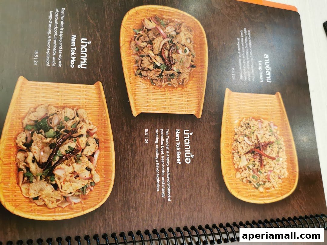 A menu page showcasing three Thai dishes with descriptions and prices.