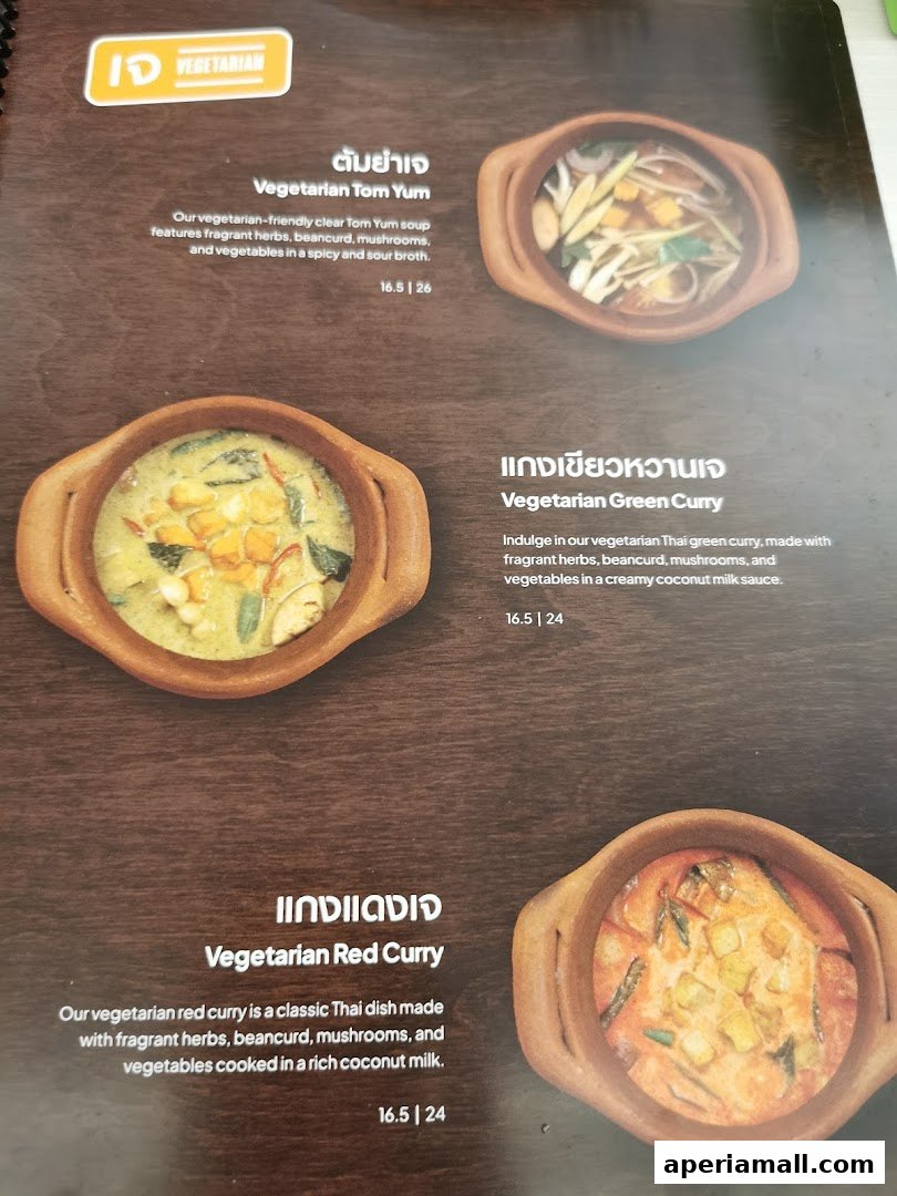 A menu featuring vegetarian Thai dishes like Tom Yum, Green Curry, and Red Curry.