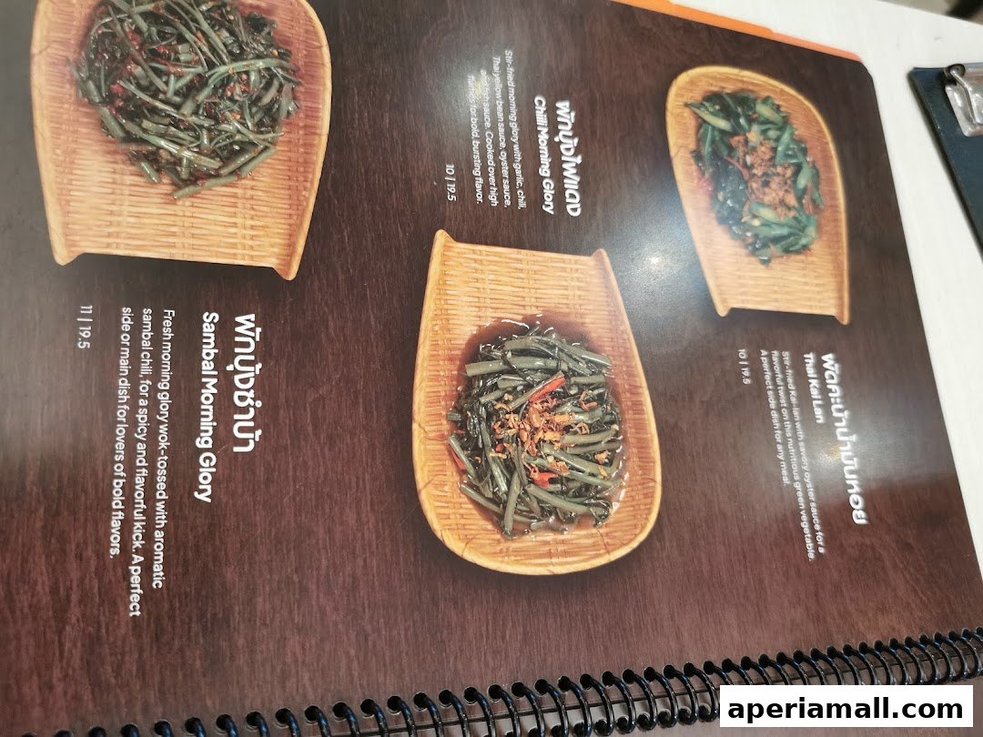 A menu page showcasing three Thai vegetable dishes with descriptions and prices.