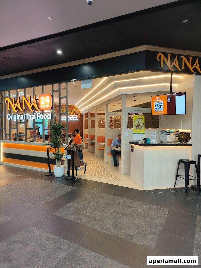 The exterior of Nana Original Thai Food restaurant with its prominent signage and inviting interior seating.