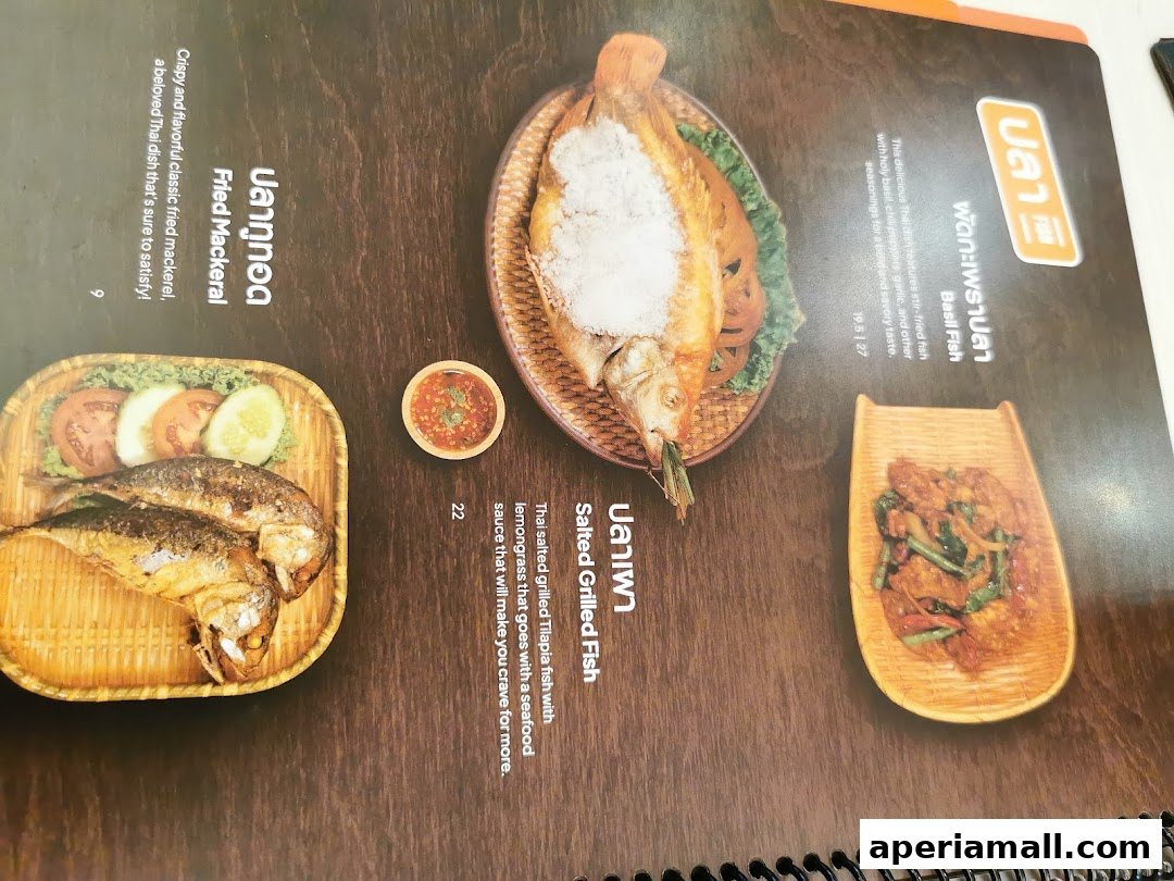 A menu page showcasing Thai dishes, including fried mackerel, basil fish, and salted grilled fish.