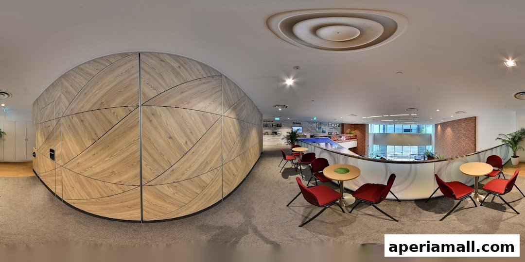 Interior view of a modern retail space with seating areas and decorative walls.