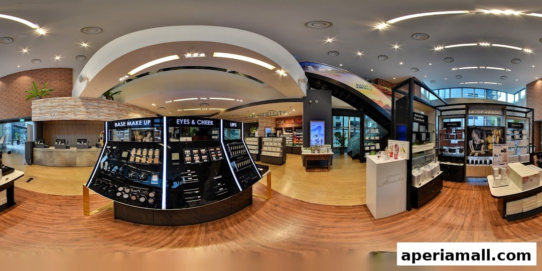Interior view of a well-lit Nutrilite store showcasing makeup and skincare products.