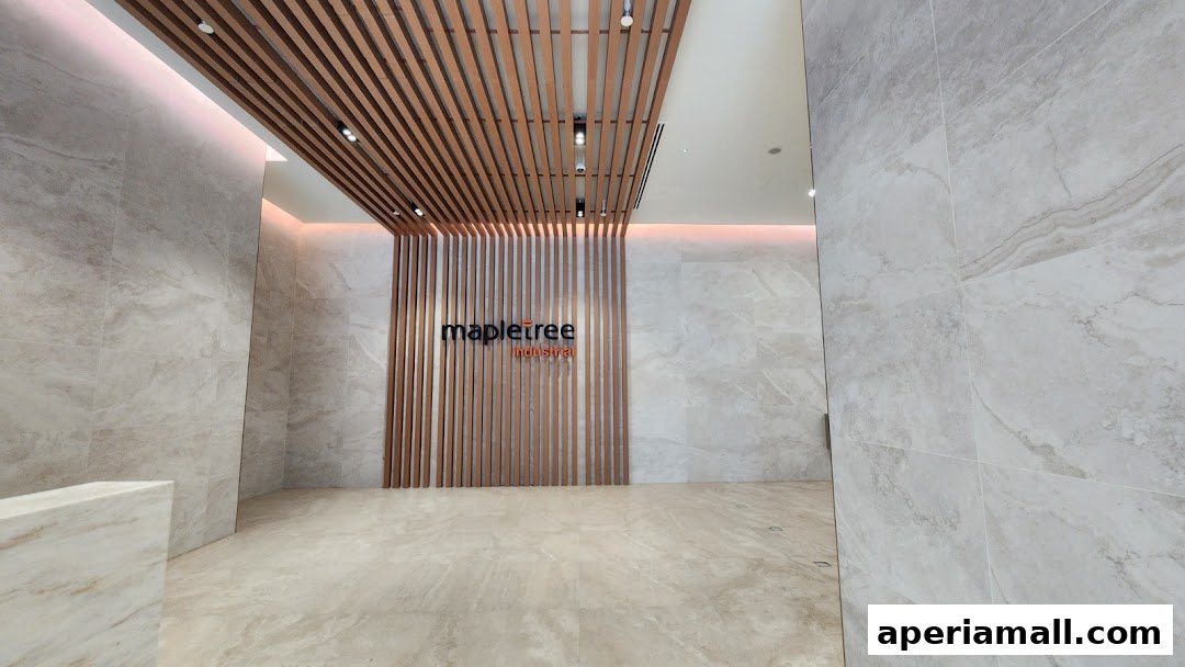 Interior view of a modern lobby with marble walls and a wooden slat feature wall.