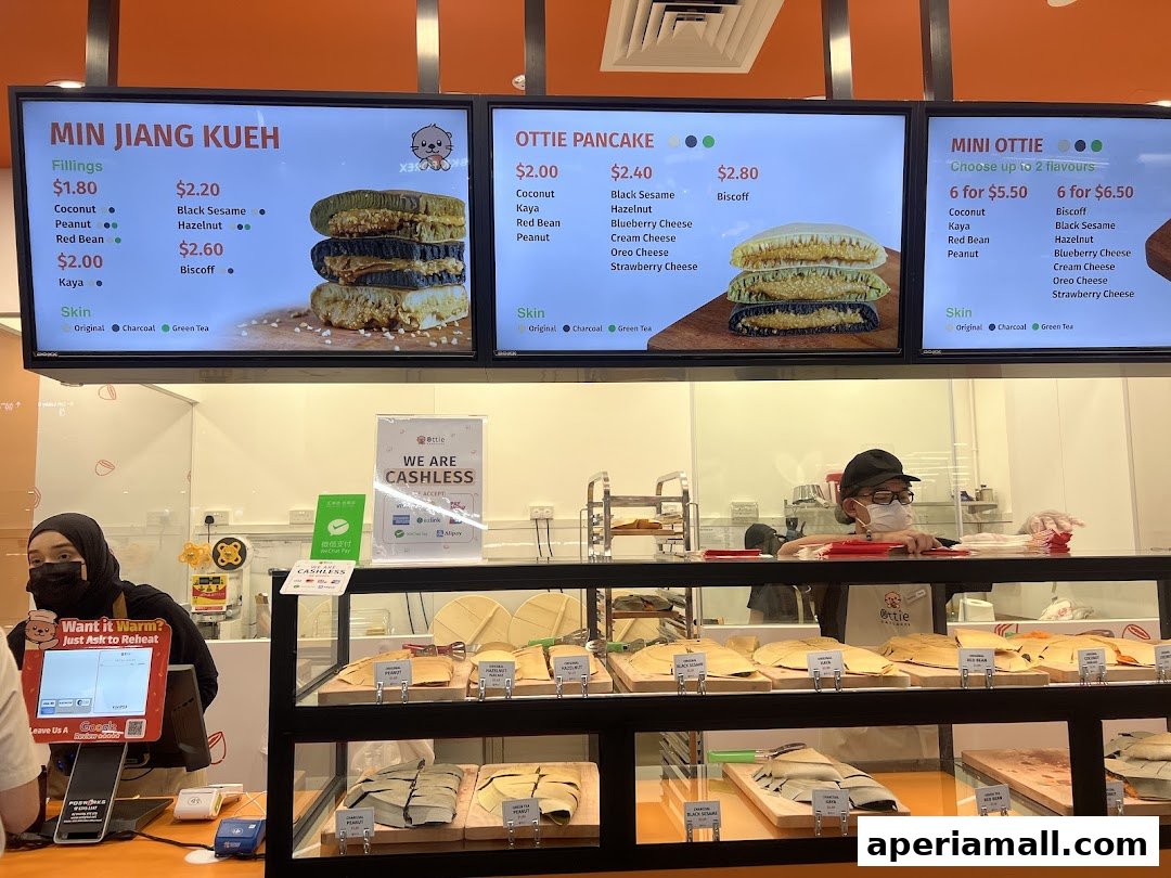 A display of various Ottie Pancakes and Min Jiang Kueh with different fillings and skin options.