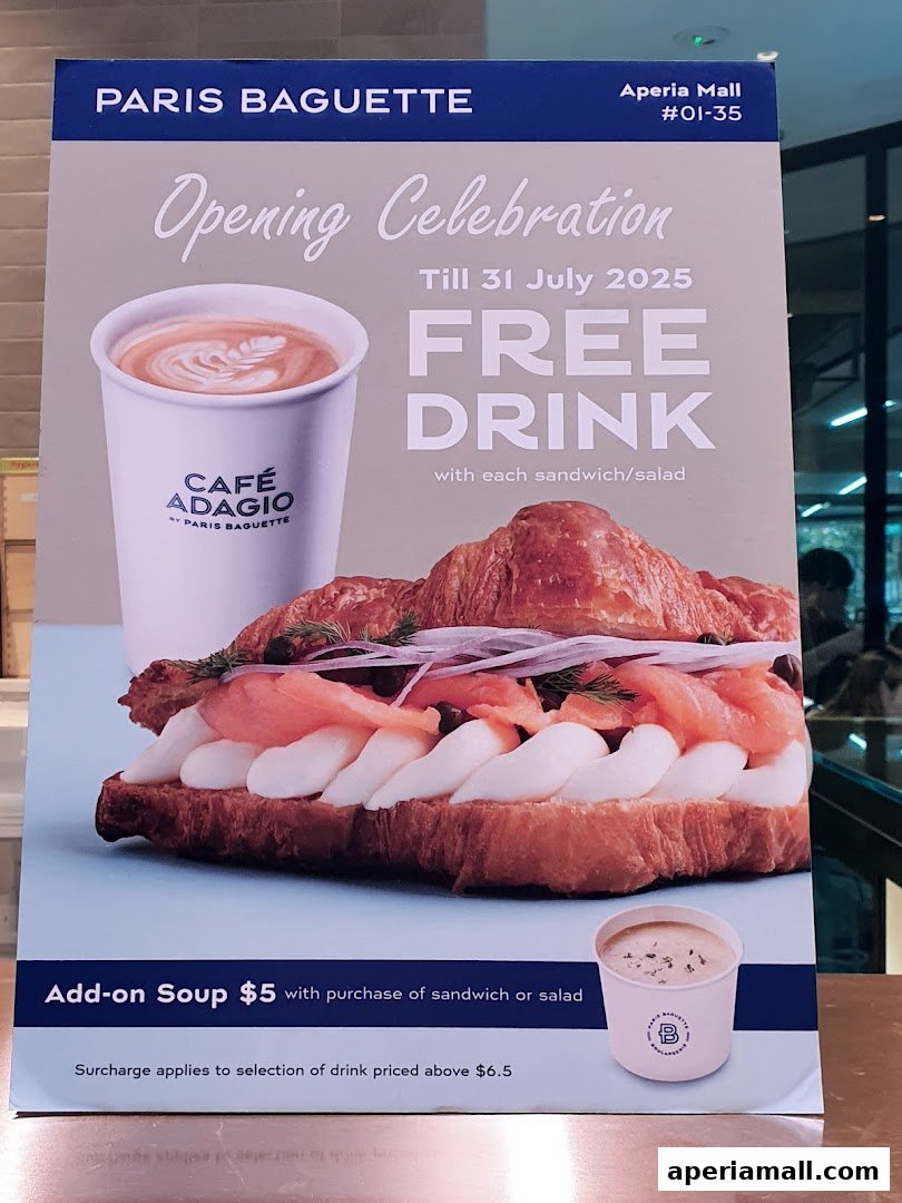 A promotional poster for Paris Baguette featuring a free drink offer with sandwiches and salads.