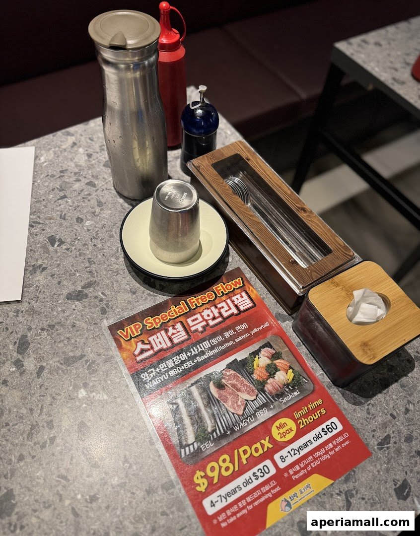 A menu for a VIP Special Free Flow meal featuring Wagyu BBQ, EEL, and Sashimi.