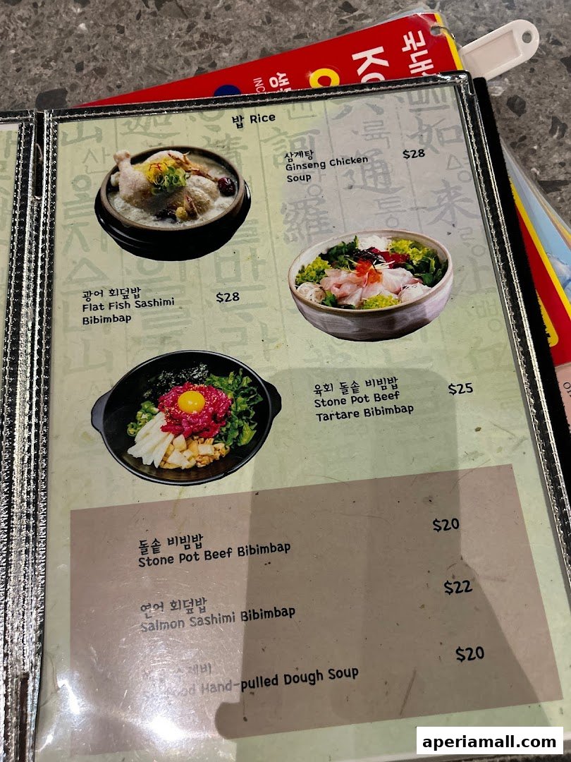 A menu featuring Korean dishes like Bibimbap, Ginseng Chicken Soup, and Sashimi.
