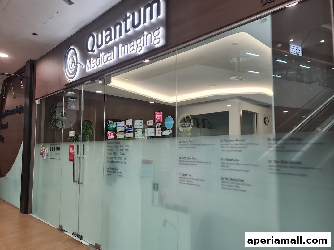 The exterior of Quantum Medical Imaging, a clinic with frosted glass doors and signage.