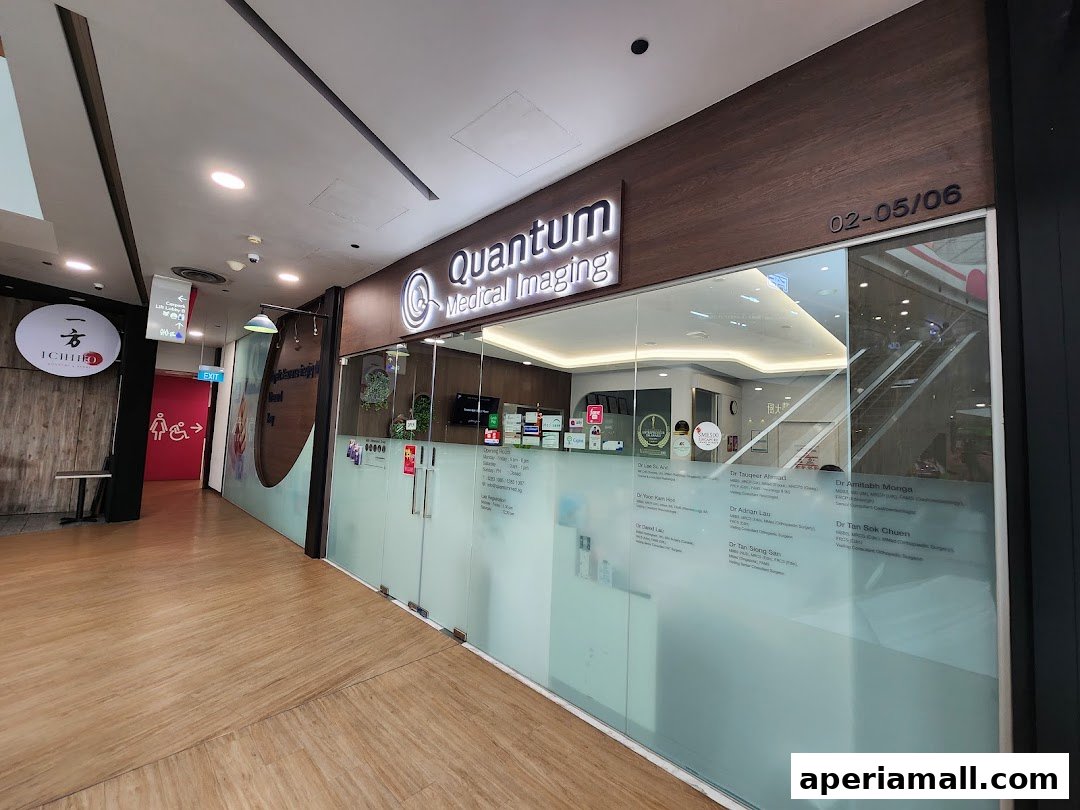 The exterior of Quantum Medical Imaging, a clinic with frosted glass doors and a prominent sign.