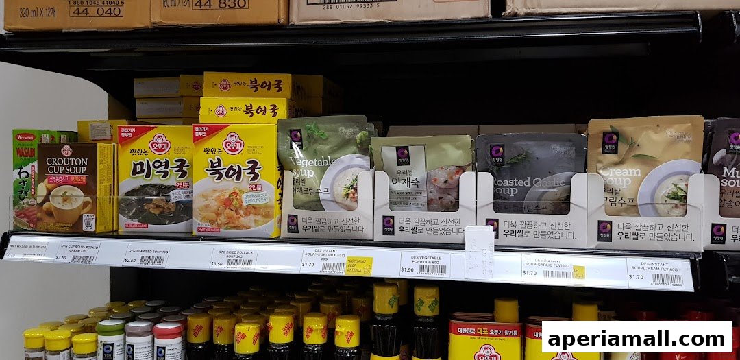 Shelves stocked with various Korean instant soups and porridges.