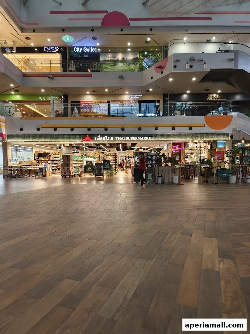 The entrance to Thai Supermarket in Aperia Mall, showcasing aisles of products and a welcoming storefront.