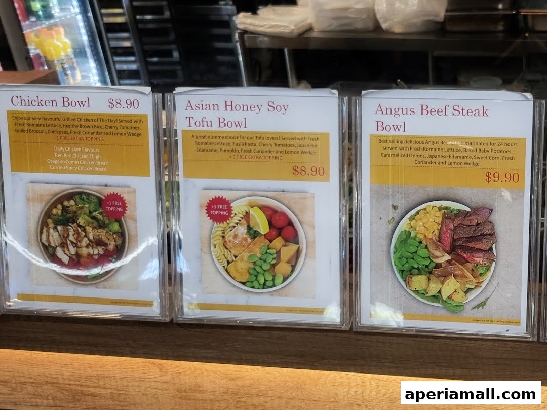 Three menu boards displaying protein bowls with descriptions and prices.