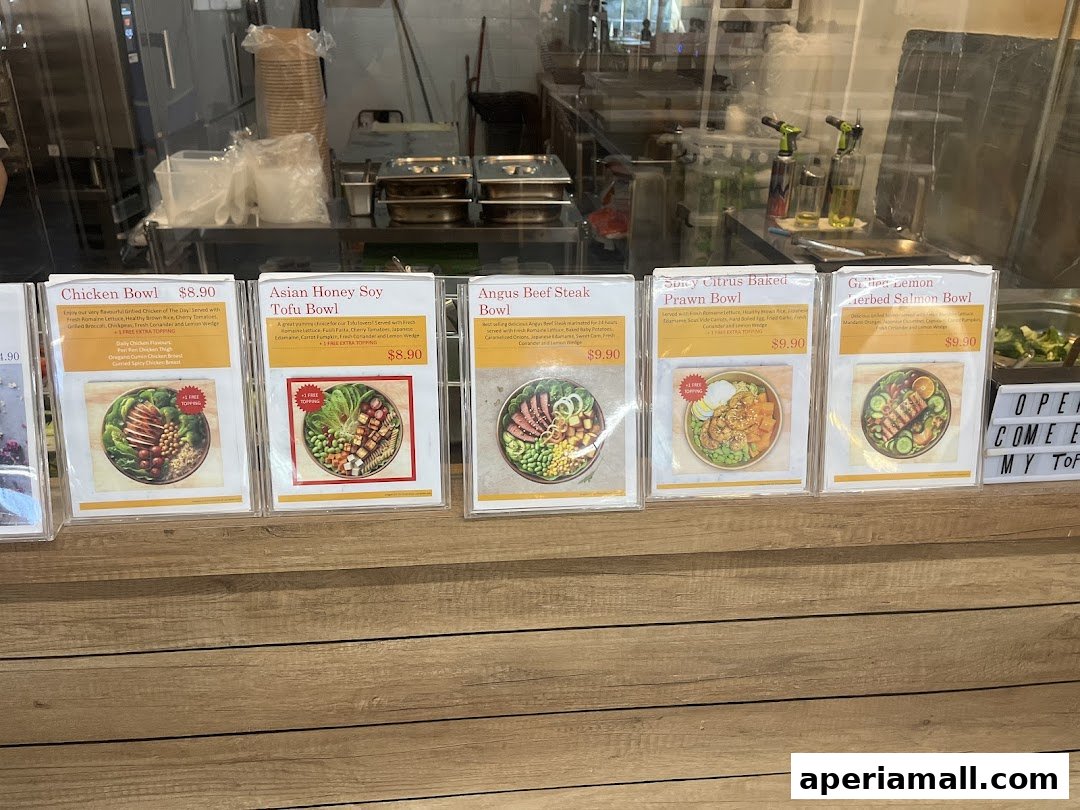 A display of five different protein bowls with their names and prices.