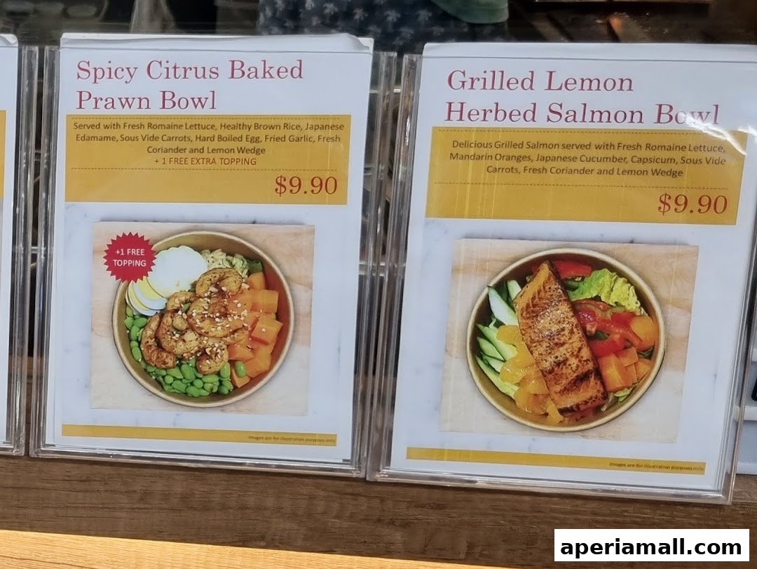 Two healthy bowls with protein and fresh ingredients are displayed.