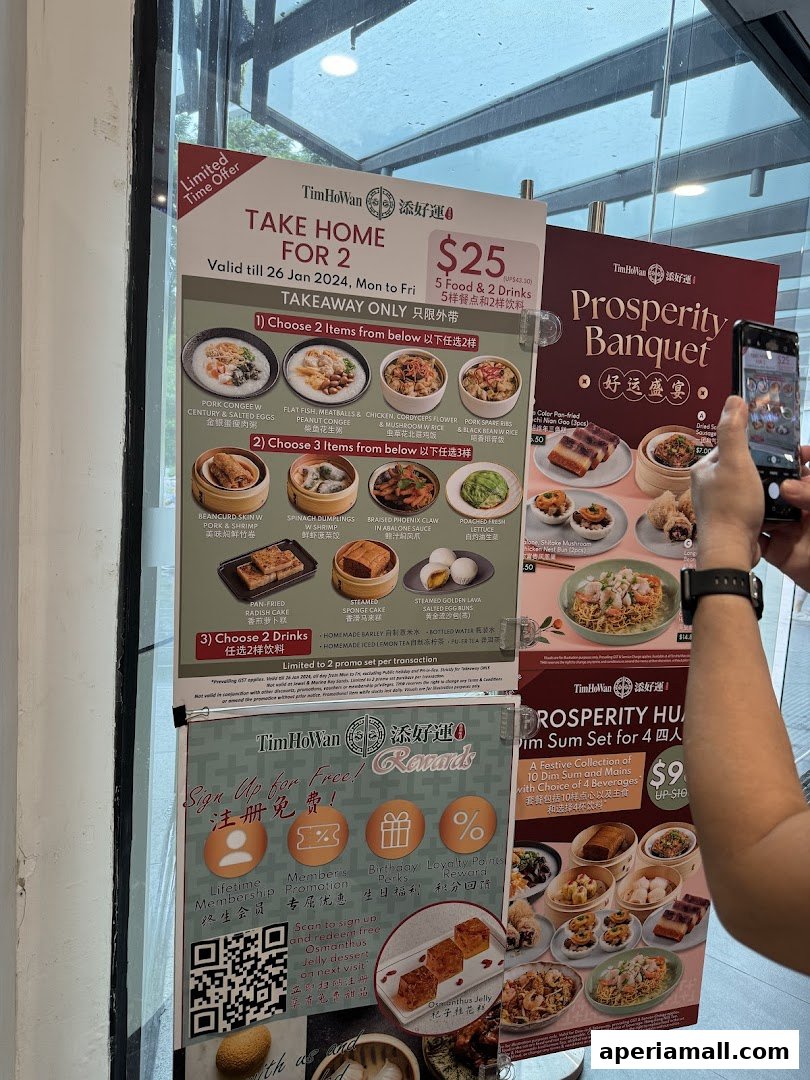 Promotional posters for Tim Ho Wan's takeaway and banquet deals, with a person taking a photo.