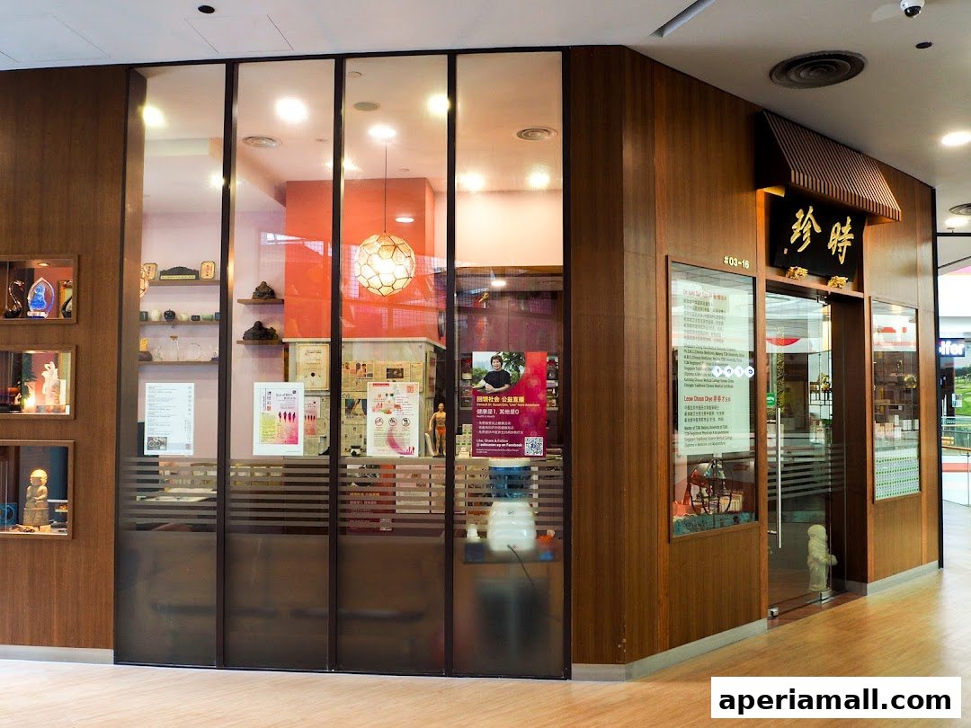 The exterior of Time Enterprise TCM, a traditional Chinese medicine shop, with wooden accents and glass panels.