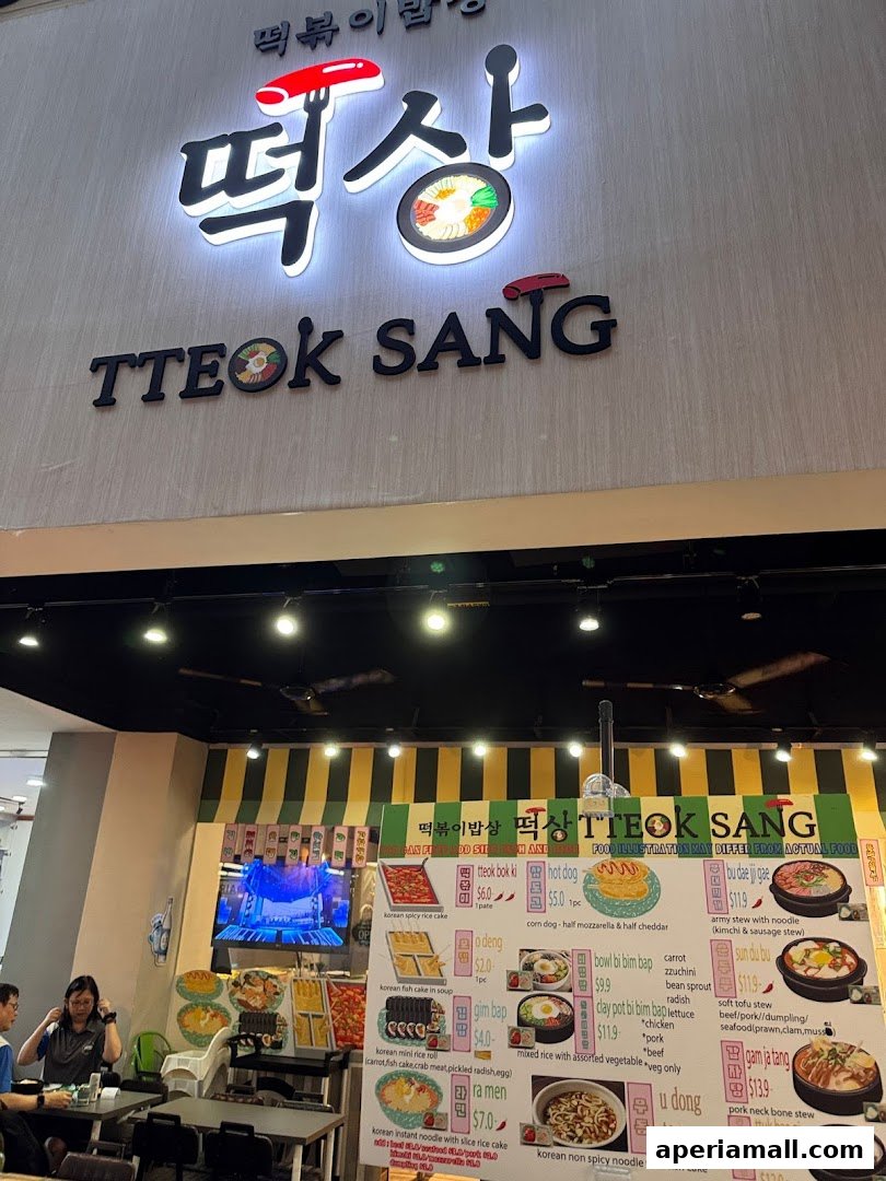 A brightly lit Korean restaurant menu board displaying various dishes with prices.