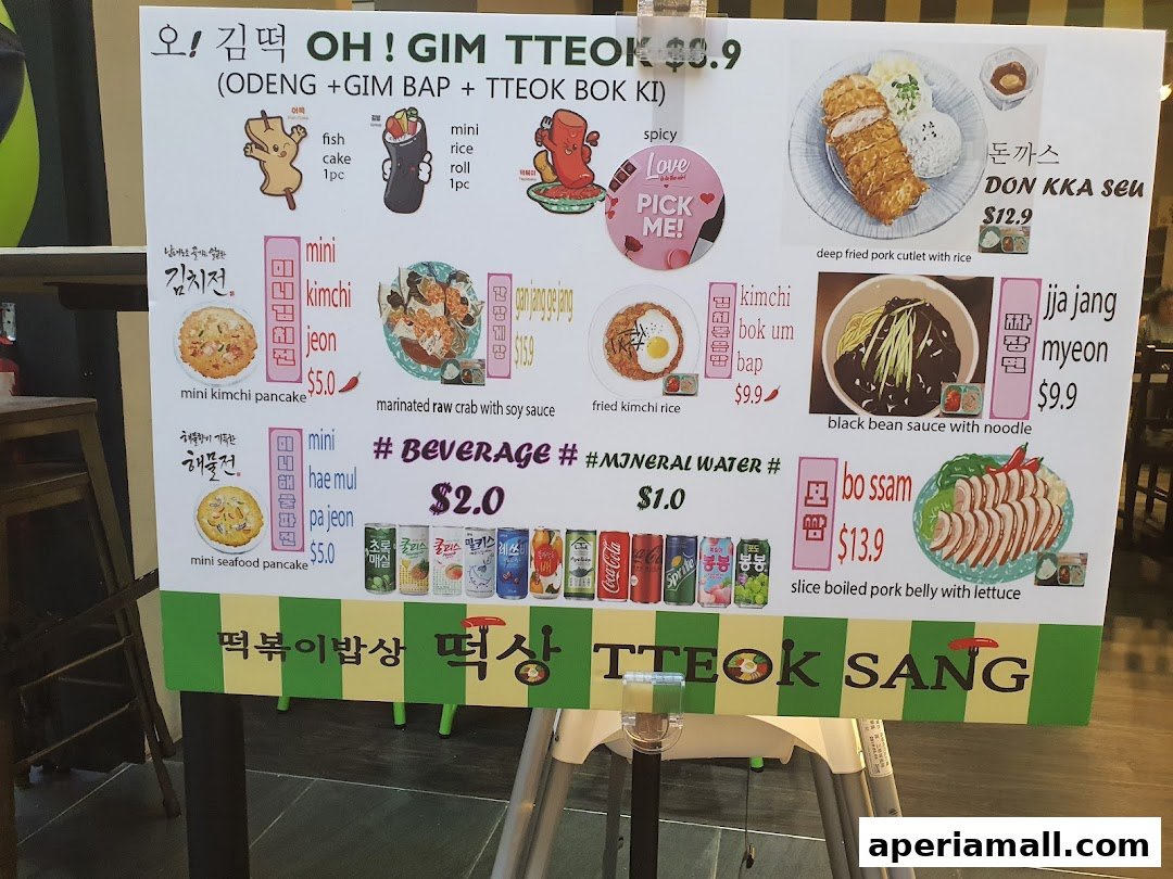 A menu board for TTEOK SANG featuring Korean dishes with illustrations and prices.