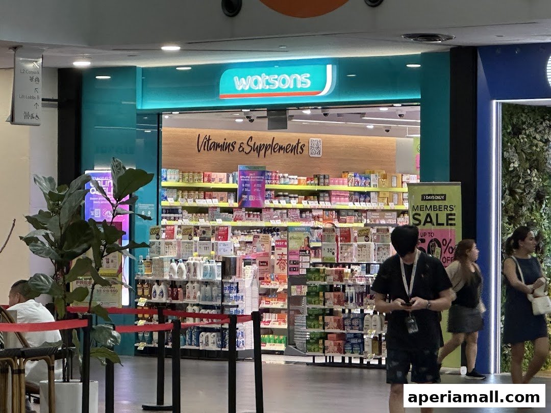 The Watsons store entrance with shelves stocked with health and beauty products.