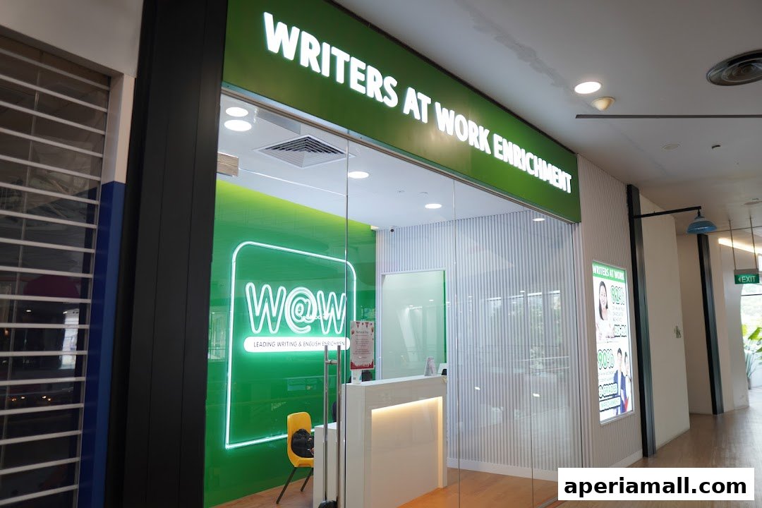 The entrance of Writers At Work Enrichment, a learning center with a bright green interior.