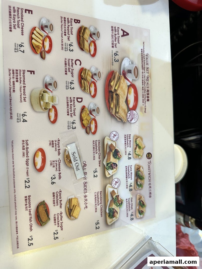 A menu from Ya Kun Kaya Toast featuring various toast sets, toastwiches, and sides.