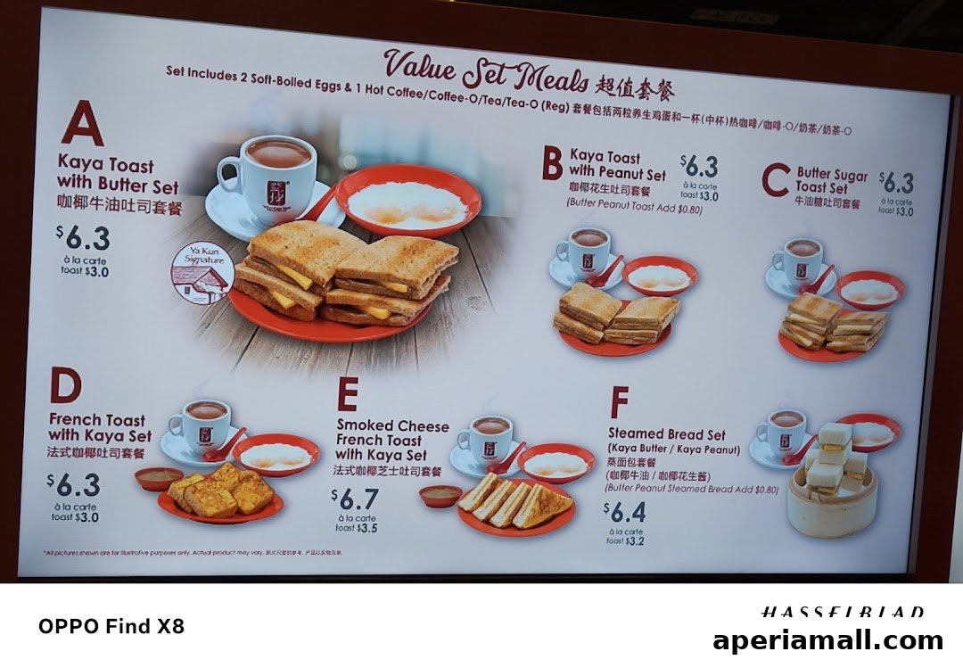 A menu board displaying various value set meals from Ya Kun Kaya Toast, featuring different toast and drink combinations.